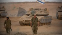 חיילים בשטח כינוס במהלך מבצע צוק איתן (צילום ארכיון: פלאש 90 / יונתן זינדל)