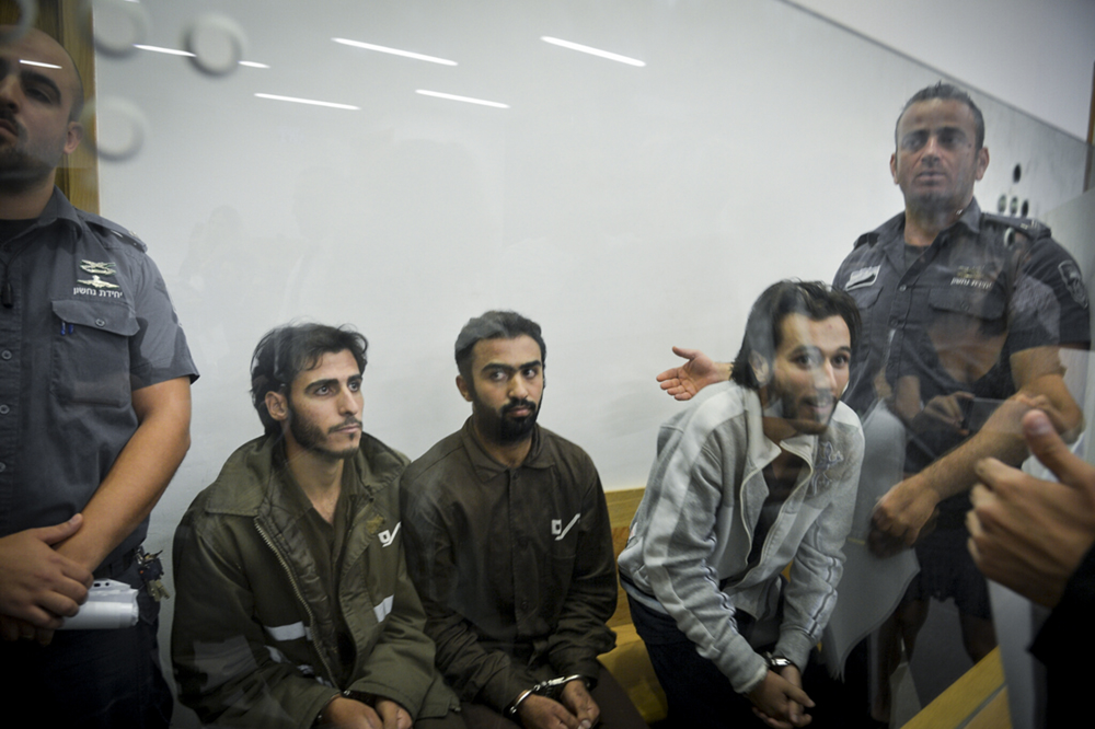 מתכנני ומבצעי הפיגוע בשרונה בבית המשפט בתל אביב. צילום: פלאש 90