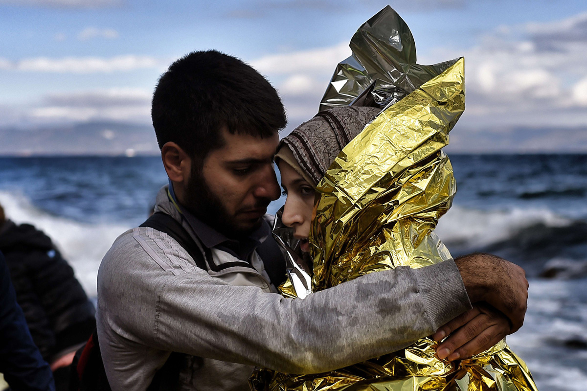 (צילום: Jordi Bernabeu Farrús מתוך flickr.<br />) פליטים מגיעים לאי לסבוס