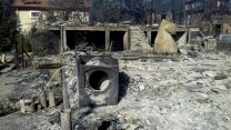 רכוש ובתים הרוסים בנווה צוף - חלמיש לאחר ההשתלטות על השריפה (צילום: דוברות המועצה האזורית מטה בנימין)