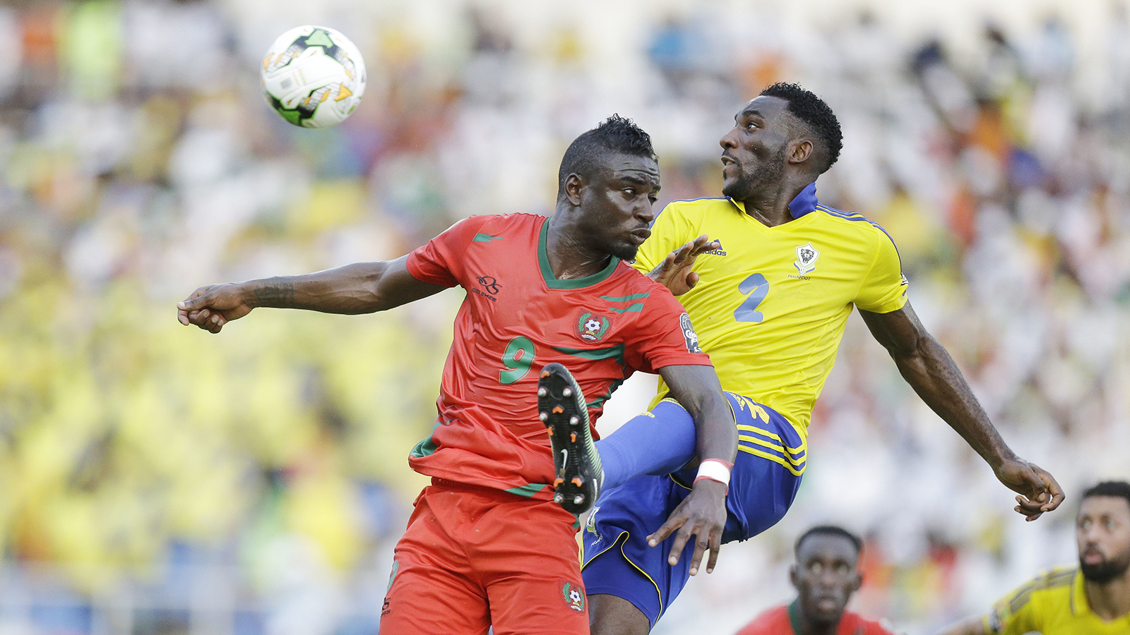 Gabon's Pierre Aaron Appindangoye, right, is challenged by Guinea Bissau's Abel Camara, left, during the African Cup of Nations Group A soccer match between Gabon and Guinea Bissau at the Stade de l'Amitie, in Libreville, Gabon Saturday Jan. 14, 2017. (AP Photo/Sunday Alamba)