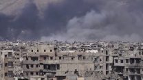 תקיפה אווירית בדמשק, סוריה. ארכיון (צילום: Qasioun News Agency, via AP)