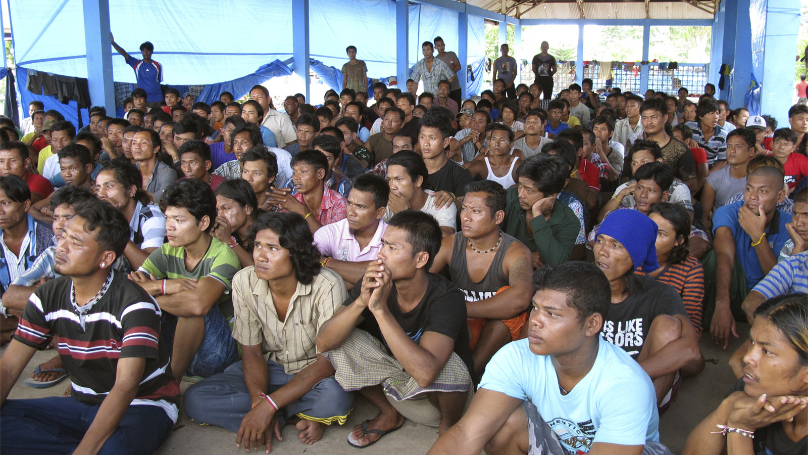 דייגים אינדונזים שחולצו מעבדות (צילום: AP Photo/Margie Mason).