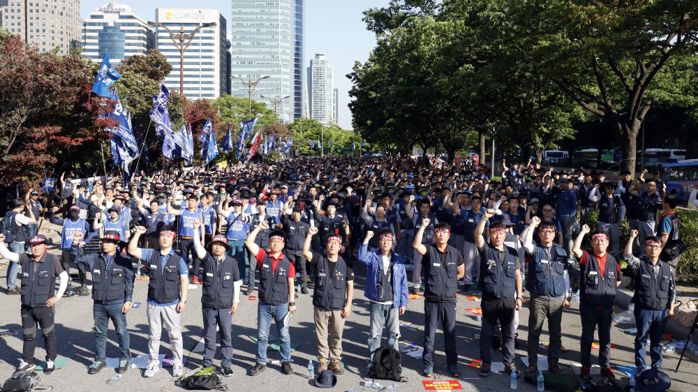 הפגנת עובדי המתכת בקוריאה הדרומית. (צילום: SHIN, Dong-Jun)