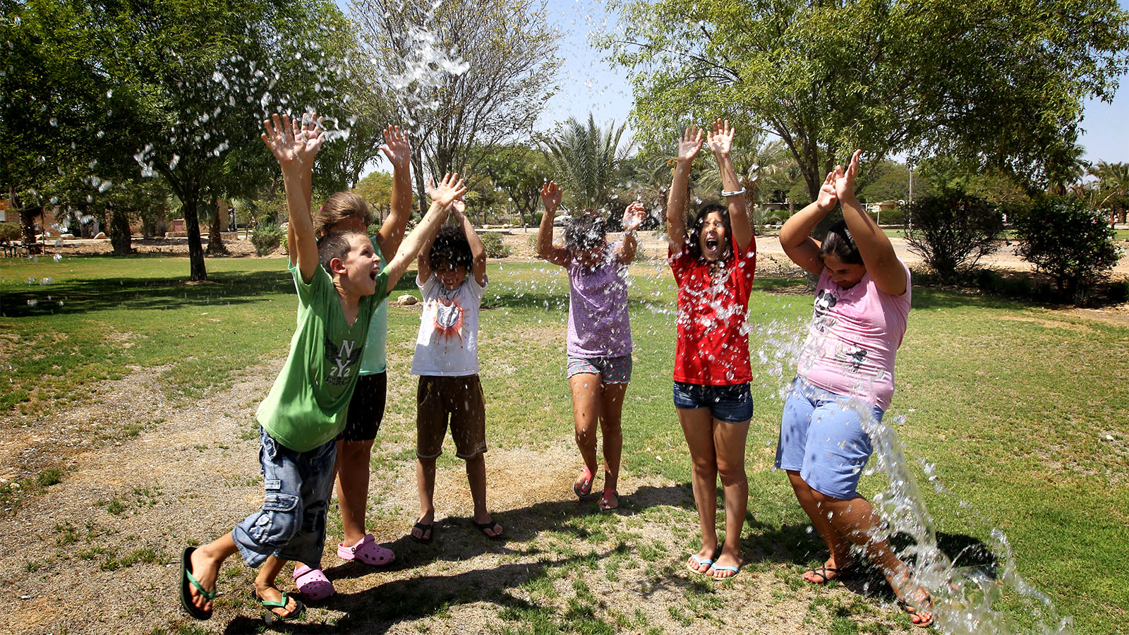 ילדים נהנים בקיץ. ארכיון (צילום: מרים אלסטר / פלאש 90).