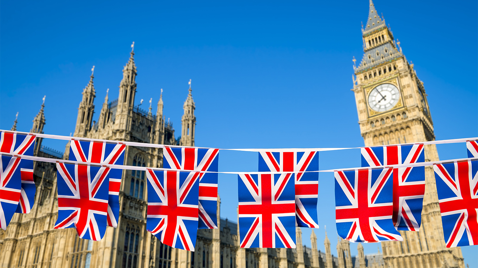 דגלי בריטניה ברקע הביג בן (צילום אילוסטרציה: shutterstock).