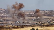 עשן מיתמר ברמת הגולן הסורית ליד גדר הגבול עם ישראל, 25.6.2017 (צילום: באסל עווידת/ פלאש 90).