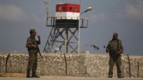 אנשי בטחון של חמאס בגבול בין עזה למצרים (AP Photo/Hatem Moussa)