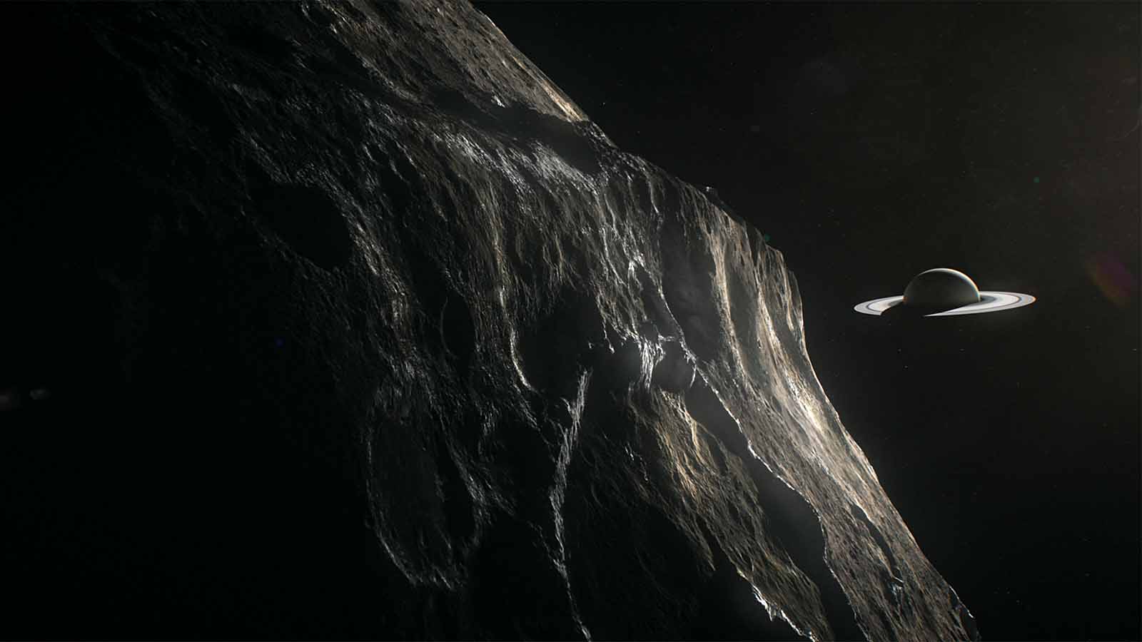 כוכב הלכת שבתאי ויאפטוס, אחד מירחיו. (NASA/Jet Propulsion Laboratory-Caltech).