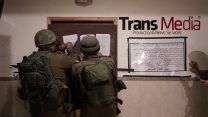 כוחות הבטחון בפשיטה על רשת התקשורת טראנס מדיה (צילום: דובר צה"ל)