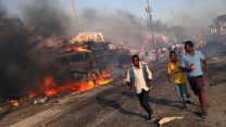אזרחים מהפיגוע במוגדישו 14 באוקטובר (צילום: REUTERS/Feisal Omar)