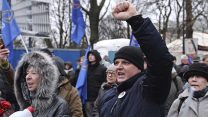 Protesters shout slogans during an anti-government demonstration in front of the parliament in Warsaw, Poland, Tuesday, Dec. 5, 2017. (AP Photo/Alik Keplicz)