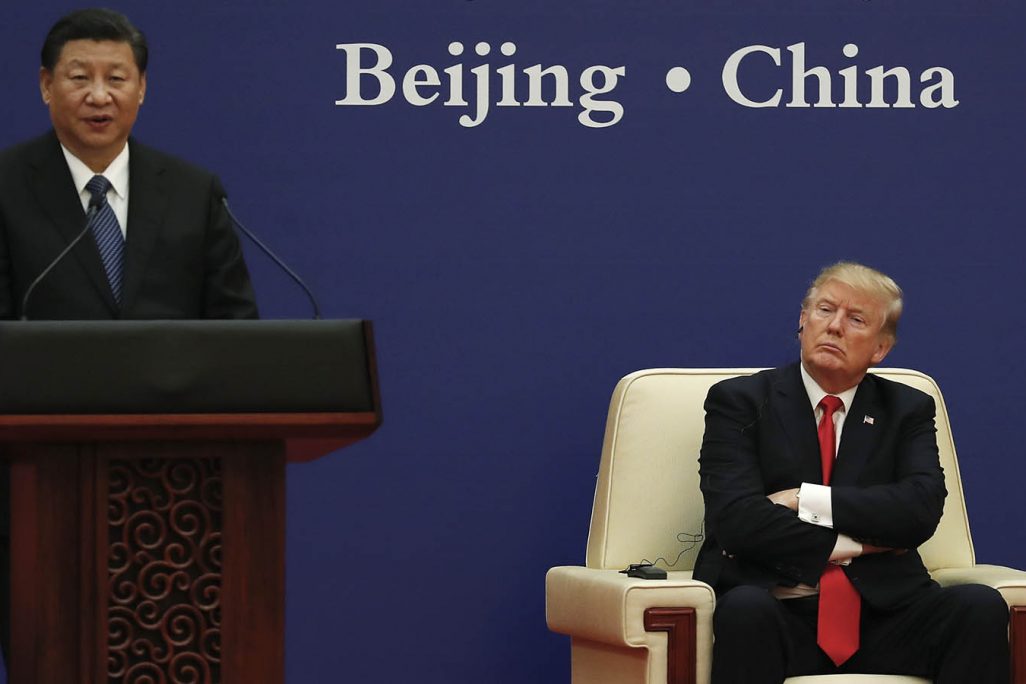 נשיאי ארה"ב וסין - דונלד טראמפ ושי ג'ינפינג בוועידה כלכלית בביג'ינג נובמבר 2017  (AP Photo/Andy Wong)