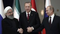 פוטין, ארדואן ורוחאני (Tolga Bozoglu/Pool Photo via AP)