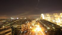 דמשק בעת הפצצות כוחות ארה״ב, צרפת ובריטניה, 14 באפריל 2018 (צילום: AP Photo/Hassan Ammar).