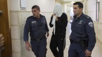 בן דרי שוטר מג"ב שהואשם בגרימת מוות ברשלנות של מפגין פלסטיני בביתוניא ב-15 במאי 2014, מובל לבית המשפט ב-30 בדצדמבר 2014 (צילום: יונתן זינדל/ פלאש90)