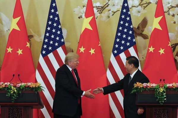 נשיאי ארה"ב וסין - דונלד טראמפ ושי ג'ינפינג בוועידה כלכלית בביג'ינג נובמבר 2017 (AP Photo/Andy Wong)