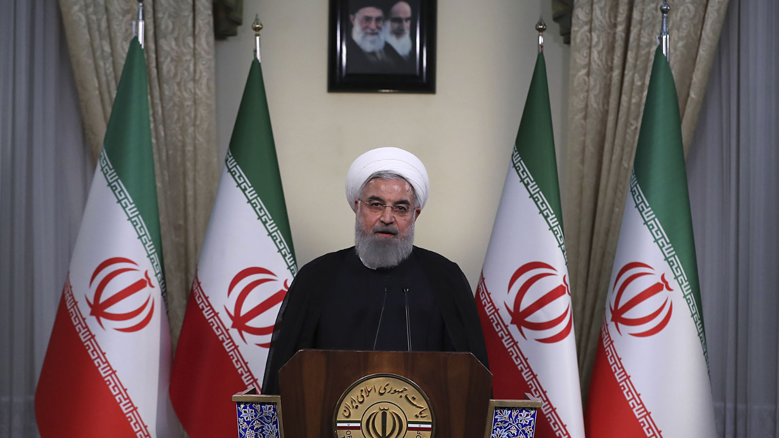 נשיא איראן חסן רוחאני בנאום בטלויזיה, 8 במאי 2018 (Iranian Presidency Office via AP)