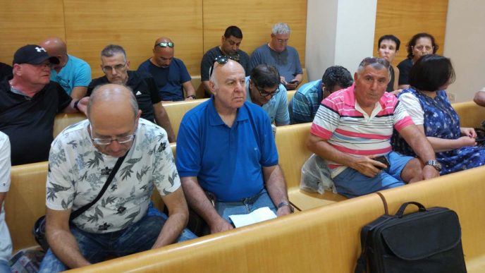 עובדי חיפה כימיקלים צפון בדיון בעניינם בבית הדין לעבודה, 5 ביוני 2018. (צילום: ארז רביב)