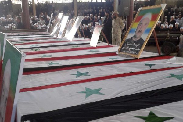 הלוויה המונית לנרצחי הפיגועים של דאע"ש בא-סווידא וסביבתה. 26 ביולי 2018 (SANA via AP)