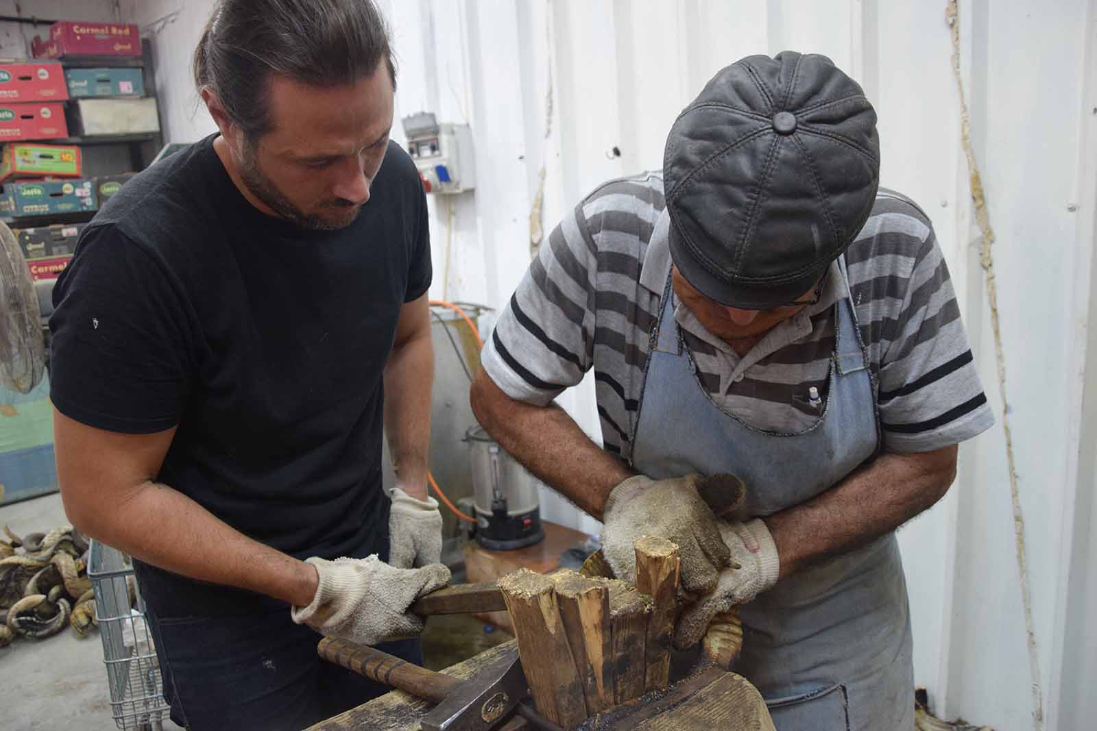 Father and son work together to produce the shofars, credit: Yael Elnatan
