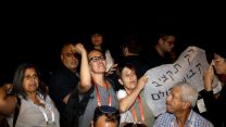 פעילות הדיור הציבורי, קוטעות את הנאומו של שר האוצר בכנס כלכליסט, 5 בספטמבר 2018 (ללא קרדיט)