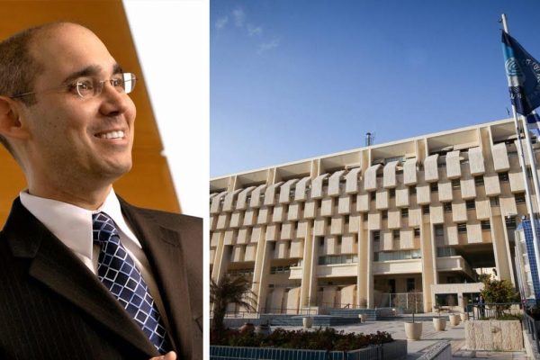 פרופ' אמיר ירון על רקע בנק ישראל (נתי שוחט/פלאש90 | The Wharton School)