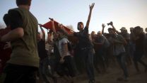 הפגנות על הגדר, 12 באוקטובר 2018 (AP Photo/Khalil Hamra)