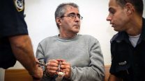 שמואל דיטשווילי בבית המשפט לאחר שרצח את גרושתו אביטל רוקח בת ה-45. 5 בספטמבר 2014 (צילום: פלאש90)