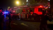 כוחות ביטחון והצלה בזירת שריפה בבניין. ארכיון (צילום: יונתן זינדל/פלאש90)