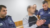מוחמד לבאבידי, החשוד ברצח אימאן אחמד, מובא לבית המשפט השלום בעכו. 12 בדצמבר 2018 (צילום: מאיר ועקנין/פלאש90)