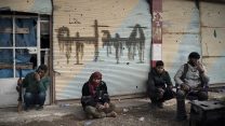 הכוחות הדמוקרטיים הסוריים בעיירה בגואז בסוריה (צילום: AP Photo/Felipe Dana).