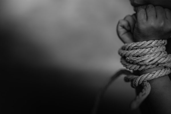 סחר בבני אדם. אילוסטרציה (Shutterstock)
