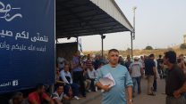 פעילות הסברה לעובדי בניין פלסטינים במעבר גבול שער אפריים (צילום: אגף  הדוברות בהסתדרות)