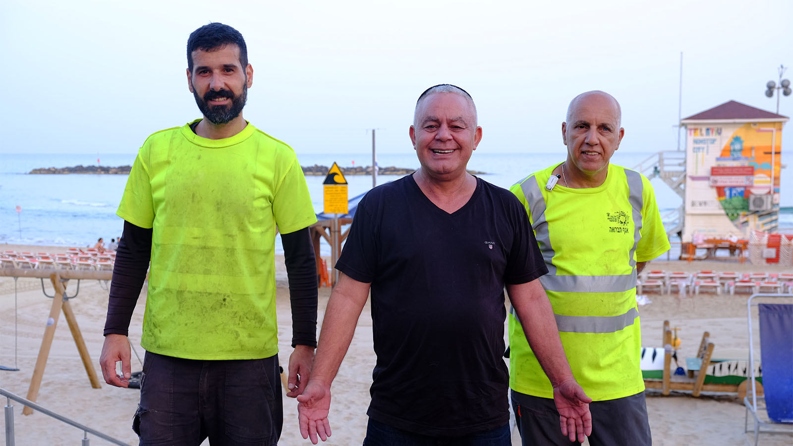 The trash collection truck team. From left: Roei Shalev, Amnon Sombol and Doron Barzelai. Credit: David Twersky