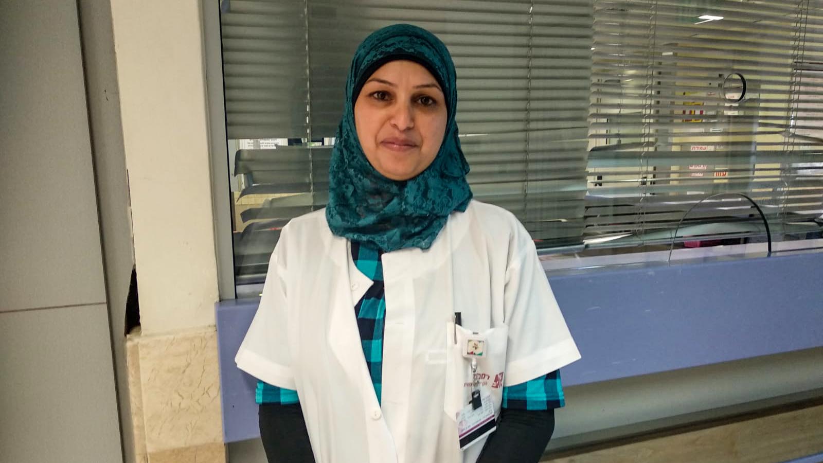 עותמאן, עובדת ניקיון בבית חולים רמב&quot;ם (צילום: יעל אלנתן)