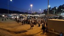 מבצע הסברה של ההסתדרות לעובדי בניין פלסטינים  במעבר תרקומיא (צילום: טל בורשטיין)