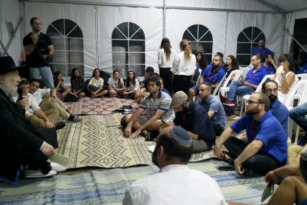 Rabbi Yisrael Lau at the 9th of Av Tent run by NOAL youth movement and Bnei Akiva, August 10, 2019 (Credit: Tom Vizel)