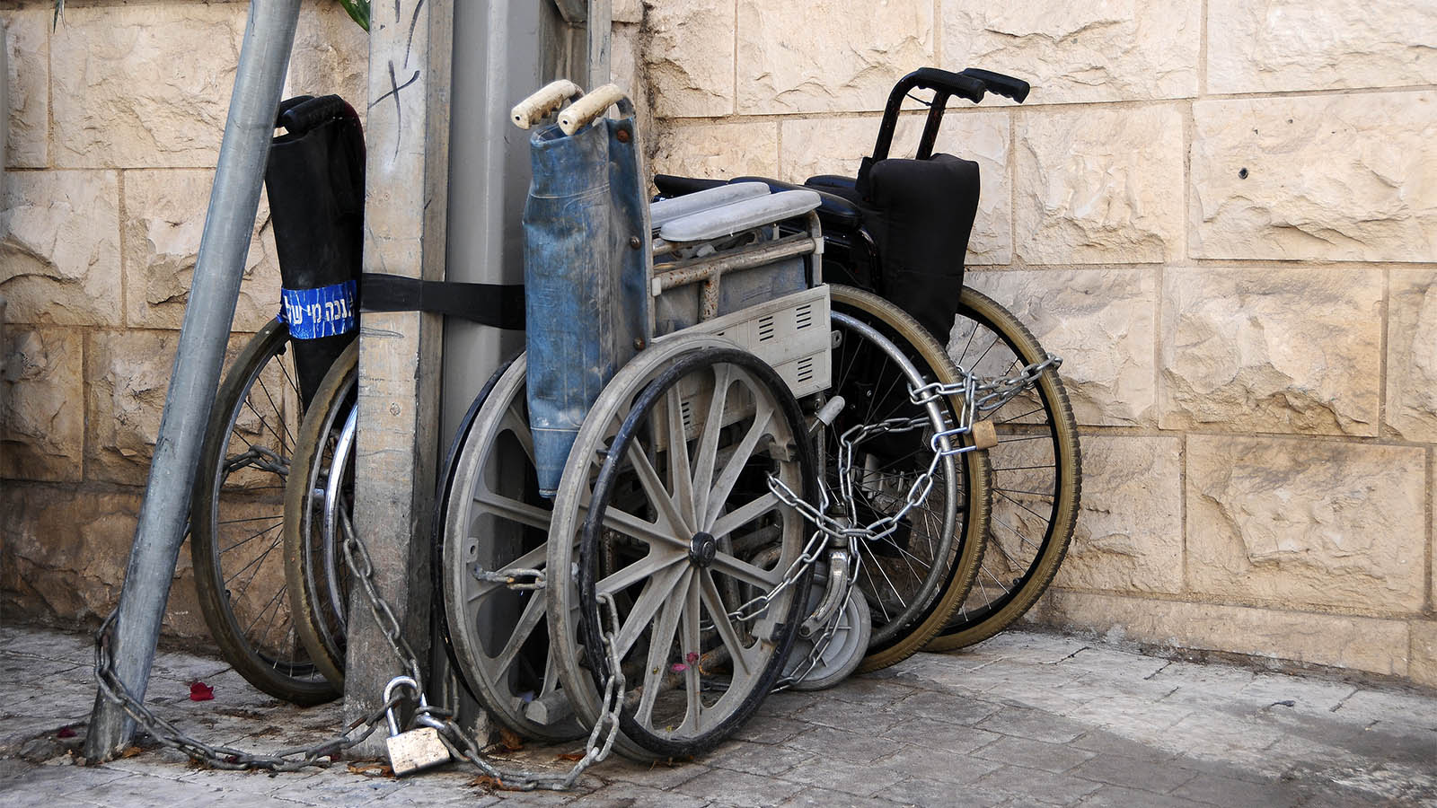 Wheelchairs locked outside of a house in Tel Aviv (Photograph: Shutterstock)