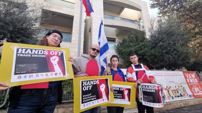 Demonstrators in front of the Philippine Embassy protest against workers' rights violations in the country. (Photo courtesy of the Federation of Working and Studying Youth)