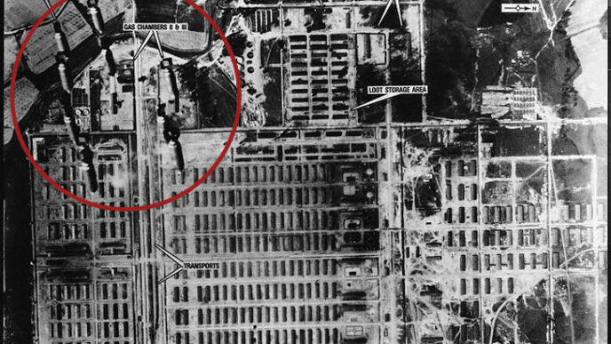 Aerial image of Allied bombing of an industrial zone near Auschwitz-Birkenau on September 13 1944. Bomb shells can be seen in the upper right corner of the image (photo: USAAC; National Archives/United States Holocaust Memorial Museum, Wikimedia)