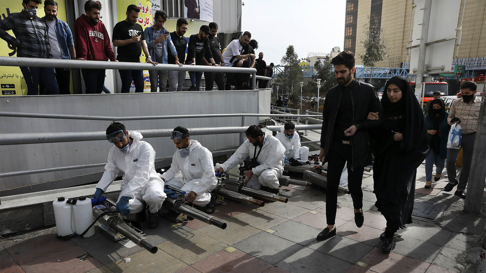 Fire services preparing to disinfect a central street in Tehran due to the coronavirus epidemic (Photograph: AP Phot/Vahid Salemi)