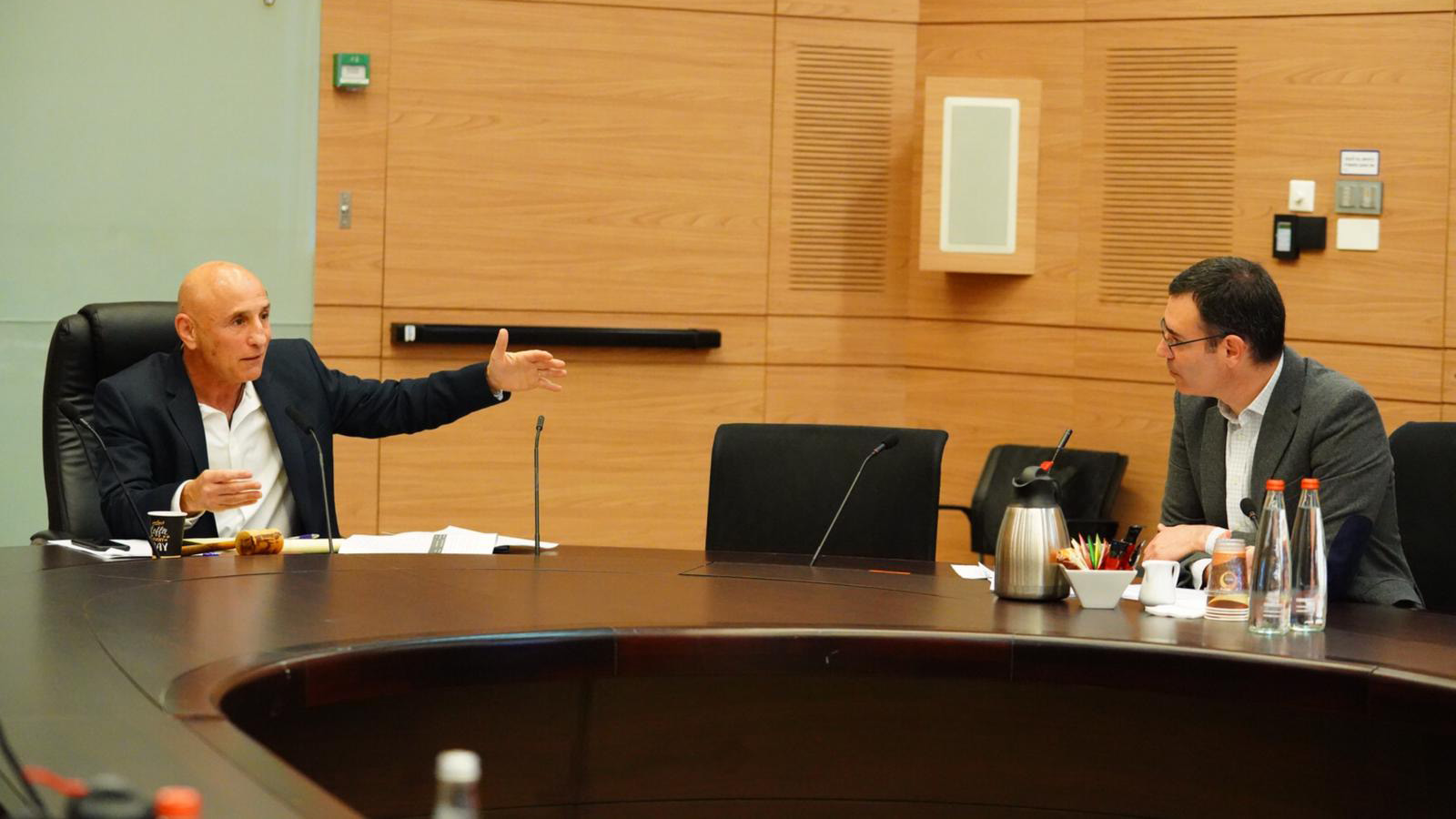 MP OFer Shelah addresses Director-General of the Ministry of Health, Moshe Bar Siman Tov (on left).(Photograph: Adina Velman)