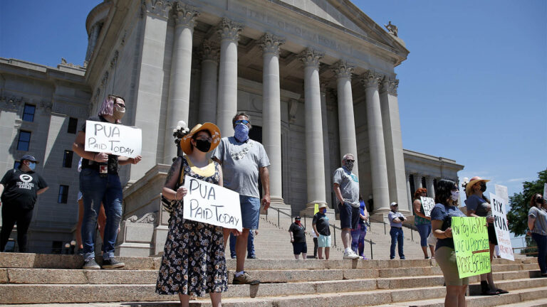Unemployed workers protest in demand of unemployment benefits in front of the Oklahoma State House (Photo: Sue Ogrocki/AP)