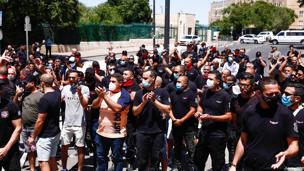 Firefighters demonstrating before the Knesset in Jerusalem, June 1 2020. (Photograph: Koby Wolf)