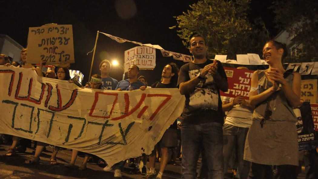 אוסאמה עאמר, 2011, במאהל המחאה בחיפה (צילום: אלבום פרטי)