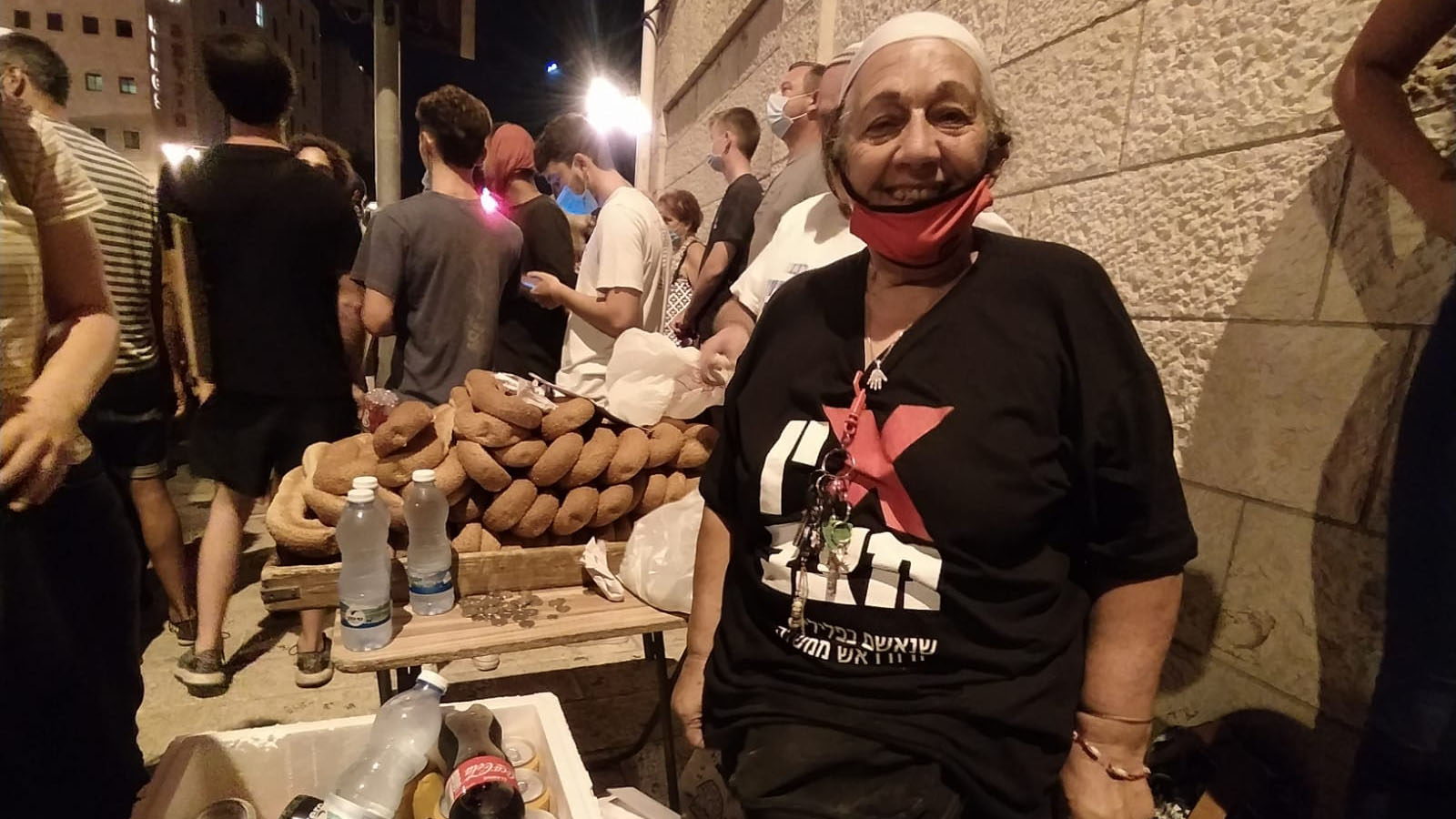Ora, 70, from Jerusalem, came to feed her children. (Photo: Yahel Faraj)