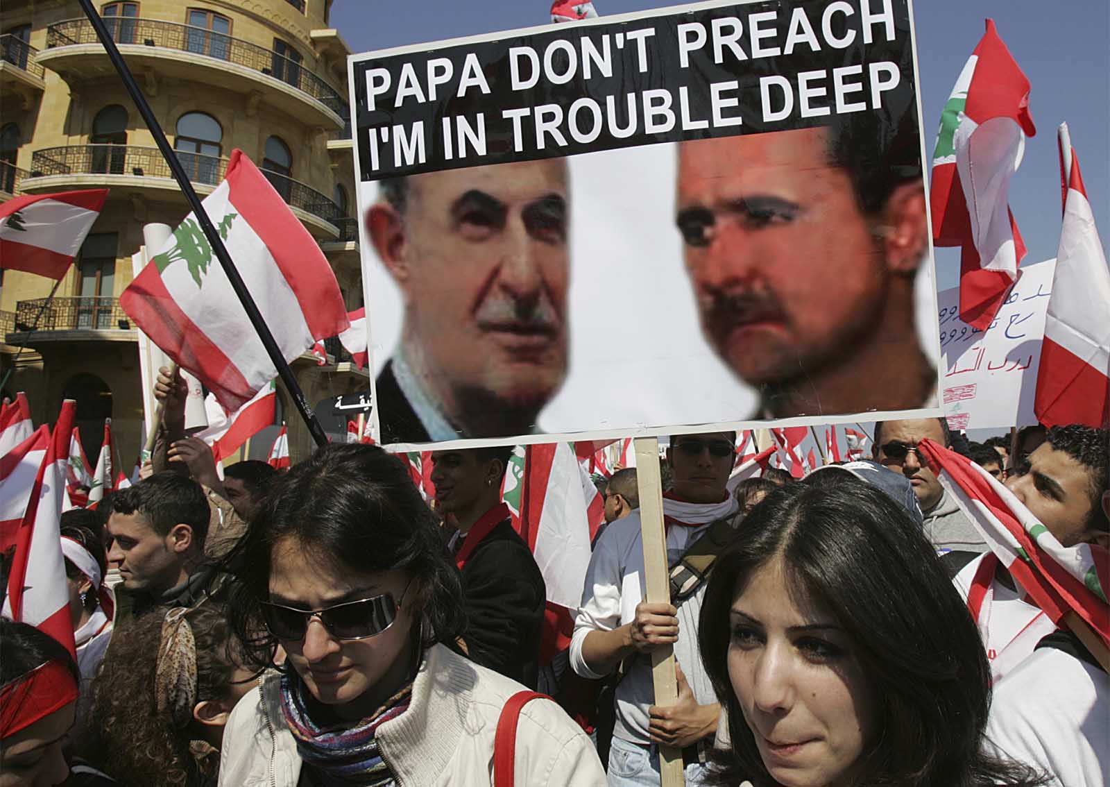 הפגנת אופוזיציה בלבנון נגד מעורבות סורית במדינה, 2005 (n. (AP Photo/Hussein Malla, File)