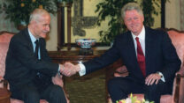 President Clinton (AP Photo/Laurent Gillieron)