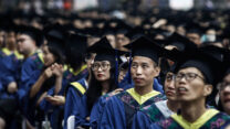סטודנטים סינים בטקס סיום. (צילום: Wang He/Getty Images)